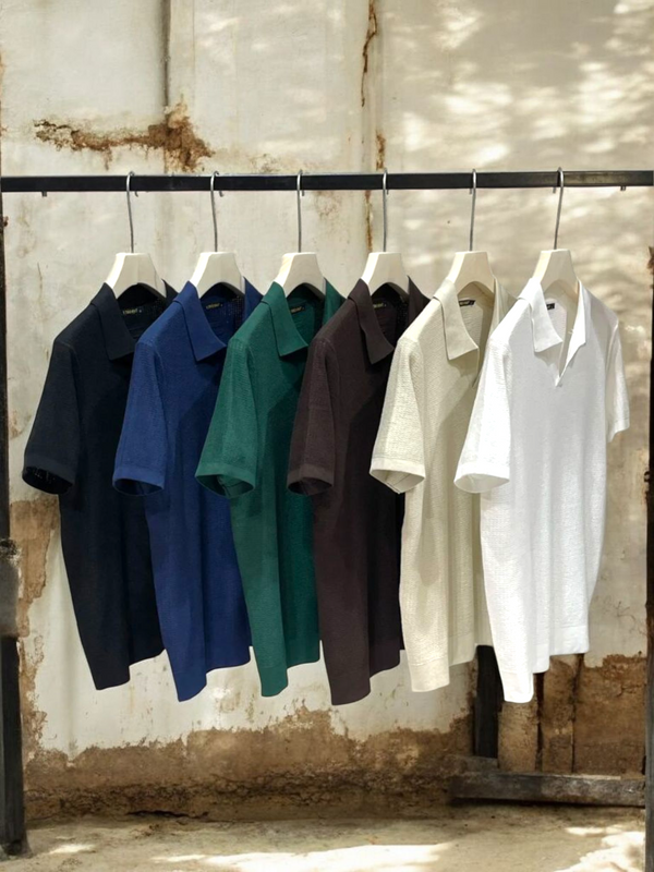 Polo lavorata a V